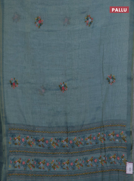 Linen saree teal blue with embroidery buttas and embroidery pallu