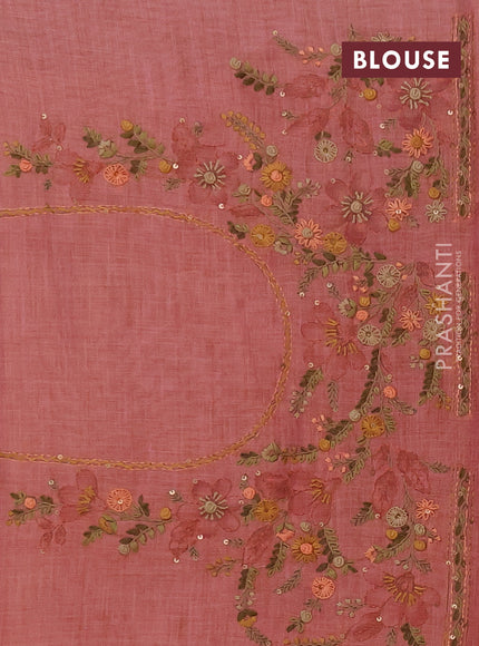 Linen saree dark peach with embroidery buttas and embroidery pallu