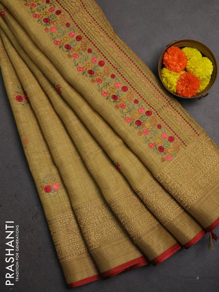 Linen saree dark mustard with embroidery buttas and embroidery pallu & border