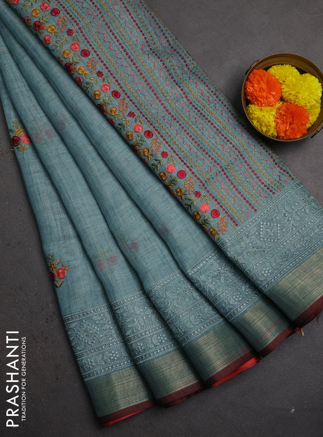 Linen saree pastel blue with embroidery buttas and embroidery pallu & border