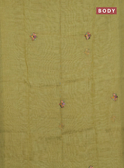 Linen saree light green with embroidery buttas and embroidery pallu