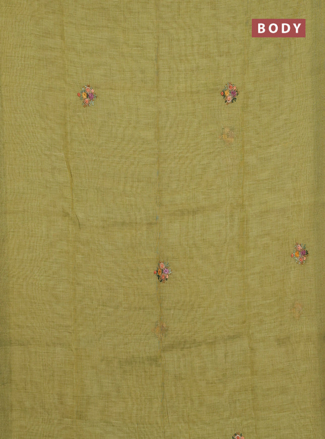 Linen saree light green with embroidery buttas and embroidery pallu