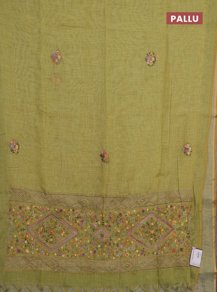 Linen saree light green with embroidery buttas and embroidery pallu