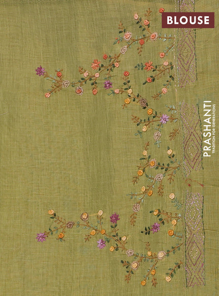 Linen saree light green with embroidery buttas and embroidery pallu