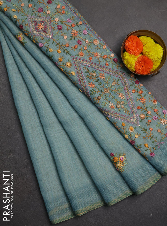 Linen saree pastel blue with embroidery buttas and embroidery pallu