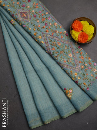 Linen saree pastel blue with embroidery buttas and embroidery pallu