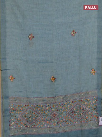 Linen saree pastel blue with embroidery buttas and embroidery pallu