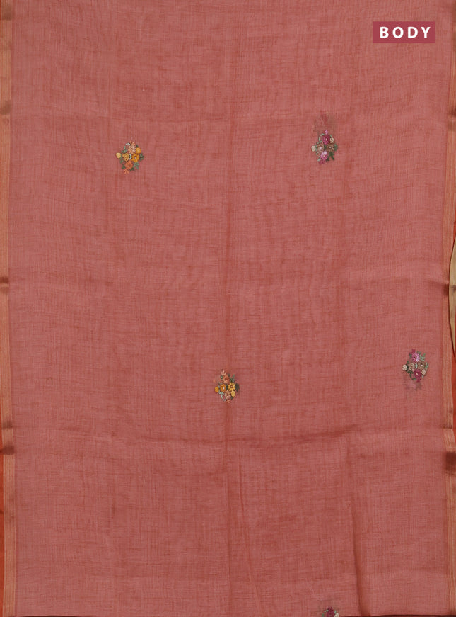 Linen saree dark peach with embroidery buttas and embroidery pallu