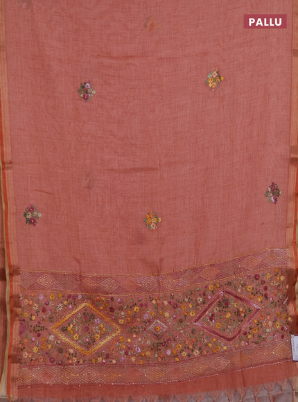 Linen saree dark peach with embroidery buttas and embroidery pallu