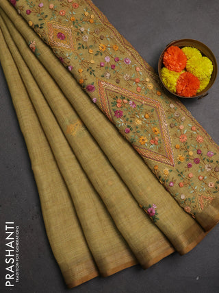 Linen saree dark mustard with embroidery buttas and embroidery pallu