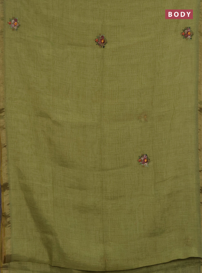Linen saree light green with embroidery buttas and embroidery pallu