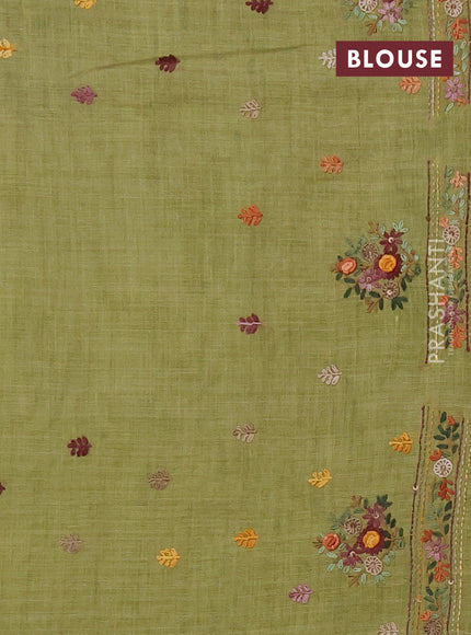 Linen saree light green with embroidery buttas and embroidery pallu