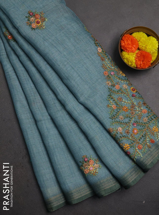 Linen saree pastel blue with embroidery buttas and embroidery pallu
