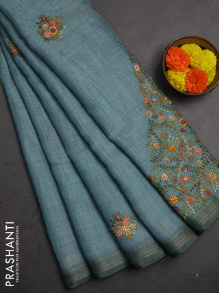 Linen saree pastel blue with embroidery buttas and embroidery pallu