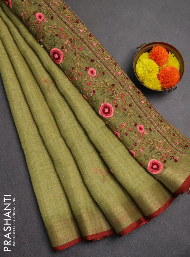 Linen saree light green and maroon with embroidery buttas and embroidery pallu