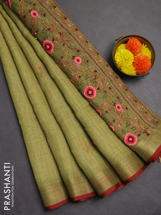 Linen saree light green and maroon with embroidery buttas and embroidery pallu