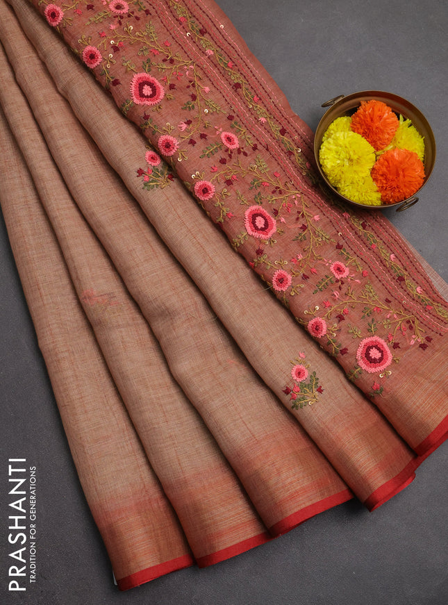 Linen saree rust shade and maroon with embroidery buttas and embroidery pallu
