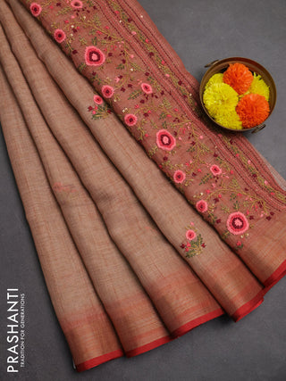 Linen saree rust shade and maroon with embroidery buttas and embroidery pallu