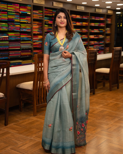 Linen saree teal blue and maroon with embroidery buttas and embroidery pallu