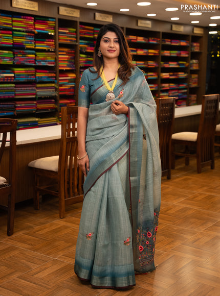Linen saree teal blue and maroon with embroidery buttas and embroidery pallu
