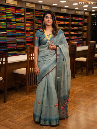 Linen saree teal blue and maroon with embroidery buttas and embroidery pallu