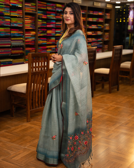 Linen saree teal blue and maroon with embroidery buttas and embroidery pallu