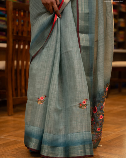 Linen saree teal blue and maroon with embroidery buttas and embroidery pallu