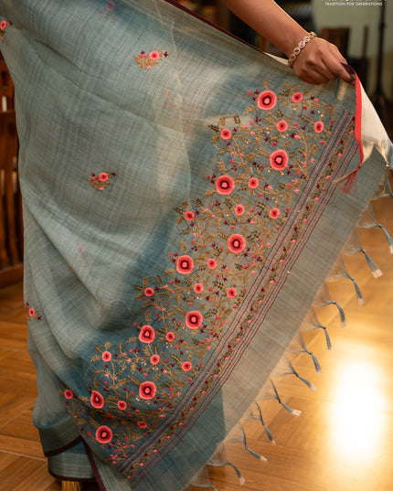 Linen saree teal blue and maroon with embroidery buttas and embroidery pallu