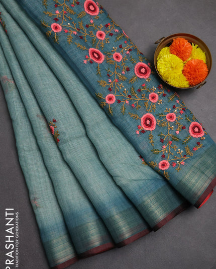 Linen saree teal blue and maroon with embroidery buttas and embroidery pallu