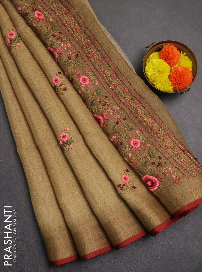 Linen saree dark mustard and maroon with embroidery buttas and embroidery pallu