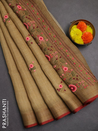 Linen saree dark mustard and maroon with embroidery buttas and embroidery pallu