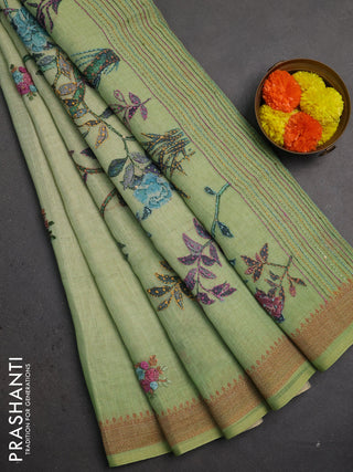 Linen saree pista green with embroidery buttas and embroidery pallu