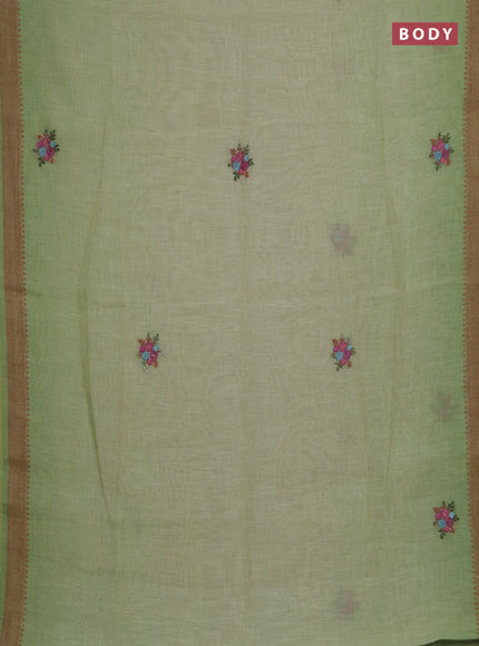 Linen saree pista green with embroidery buttas and embroidery pallu
