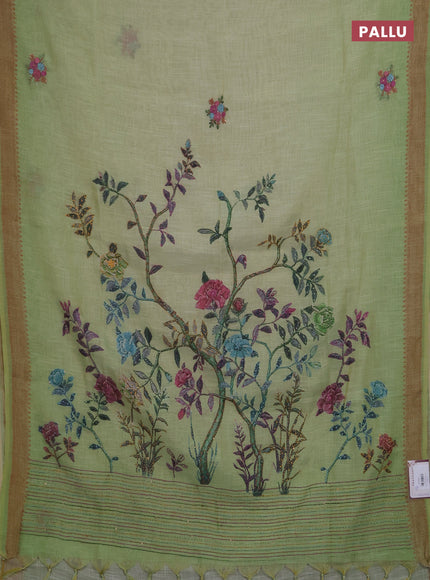 Linen saree pista green with embroidery buttas and embroidery pallu
