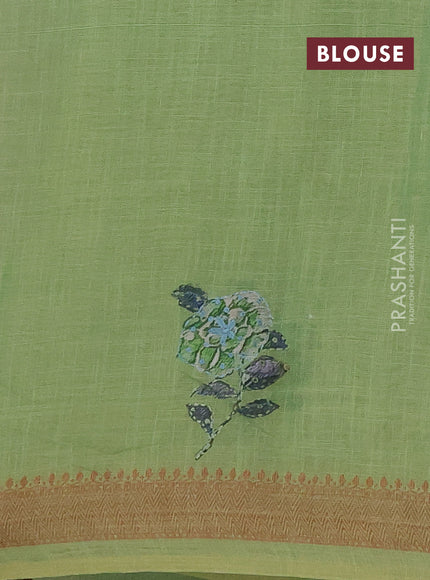 Linen saree pista green with embroidery buttas and embroidery pallu
