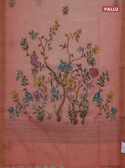 Linen saree dark peach with embroidery buttas and embroidery pallu