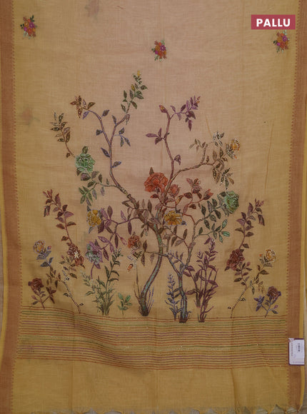 Linen saree mustard yellow with embroidery buttas and embroidery pallu