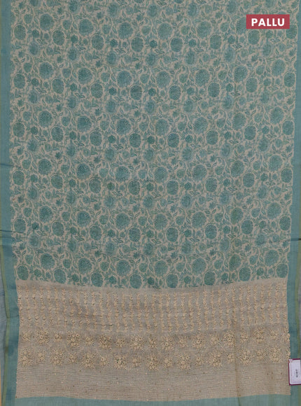 Linen saree beige and teal blue with allover floral prints and embroidery pallu