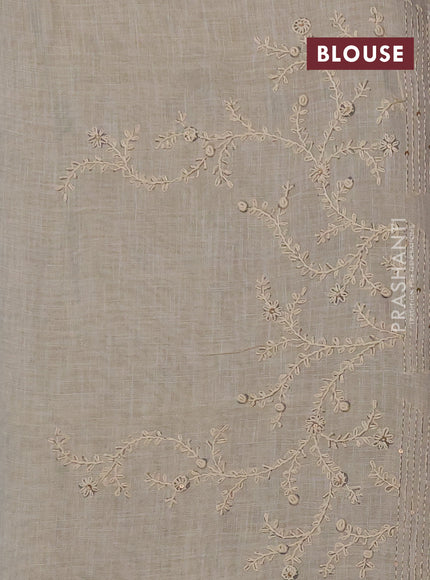 Linen saree beige and bluish grey with allover floral prints and embroidery pallu