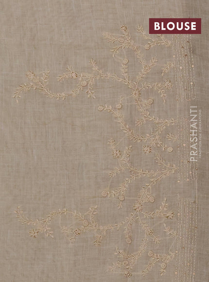 Linen saree beige and mehendi green with allover floral prints and embroidery pallu