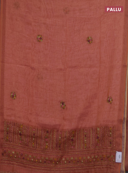Linen saree dark peach with embroidery buttas and embroidery pallu