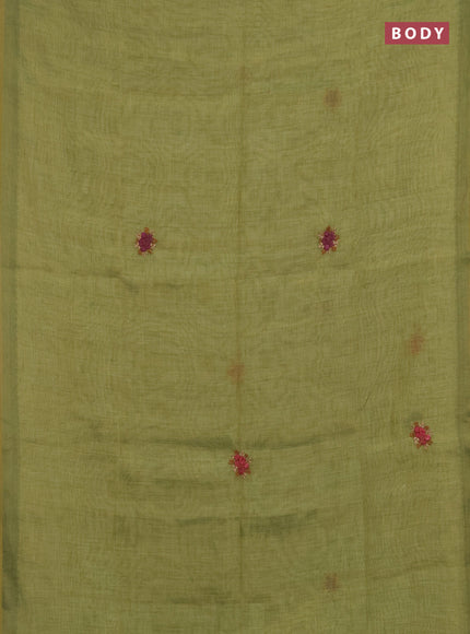 Linen saree light green with embroidery buttas and embroidery pallu