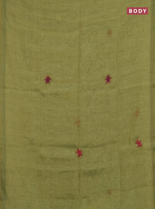 Linen saree light green with embroidery buttas and embroidery pallu
