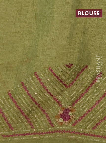 Linen saree light green with embroidery buttas and embroidery pallu