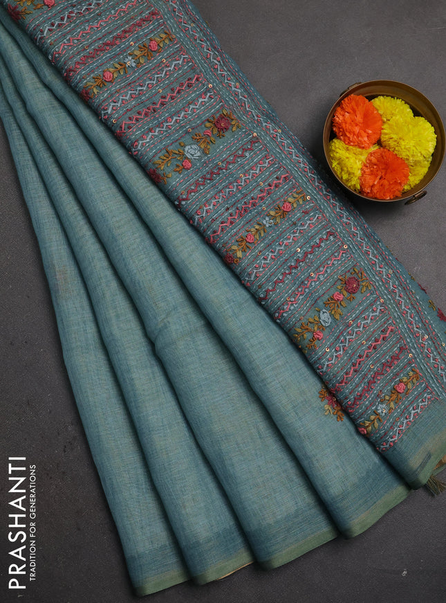 Linen saree teal blue with embroidery buttas and embroidery pallu