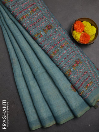 Linen saree teal blue with embroidery buttas and embroidery pallu