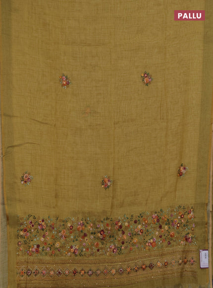Linen saree mustard yellow with embroidery buttas and embroidery pallu