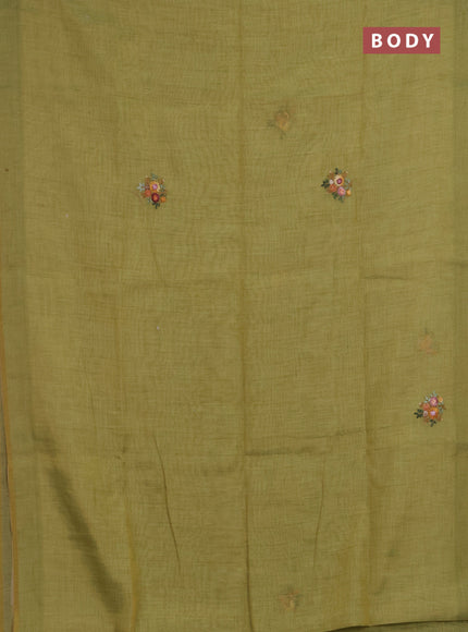Linen saree light green with embroidery buttas and embroidery pallu