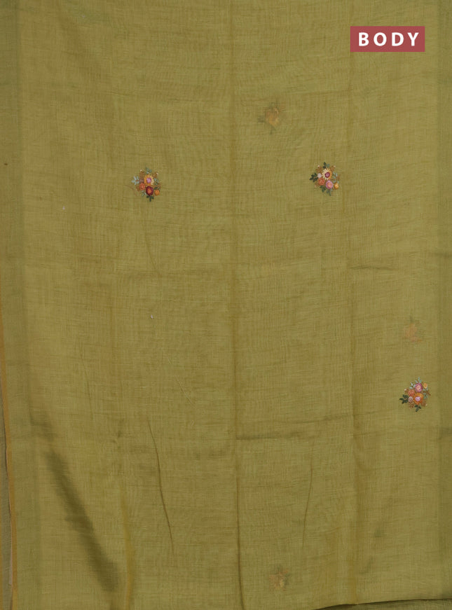 Linen saree light green with embroidery buttas and embroidery pallu