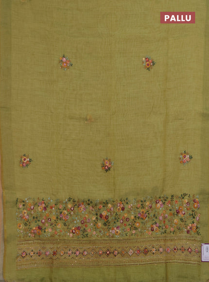 Linen saree light green with embroidery buttas and embroidery pallu